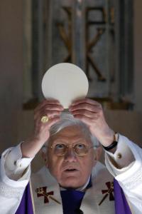 Pope Benedict XVI holds and blesses the